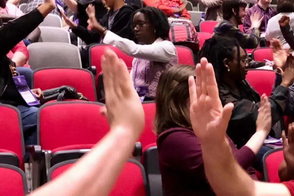 CSI Attendees giving high-fives