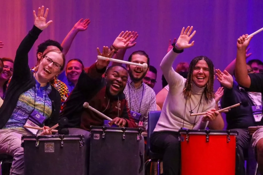 Happy Drum Performers on Stage